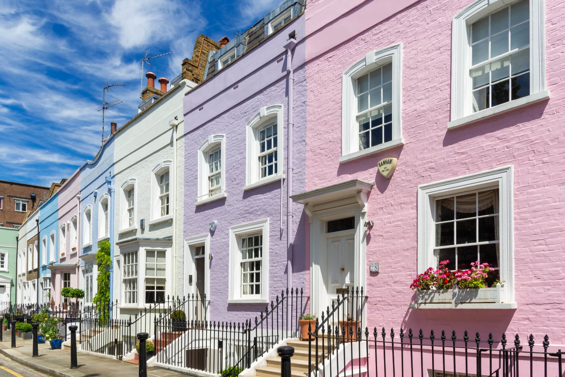 Colourful terraced town houses on Bywater Street, Chelsea, London, England, UK